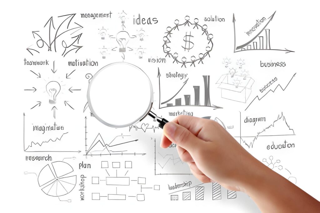 Analyzing business strategy doodles with magnifier.
