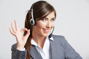 Call center employee making OK gesture