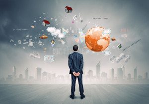 Businessman observing floating digital icons